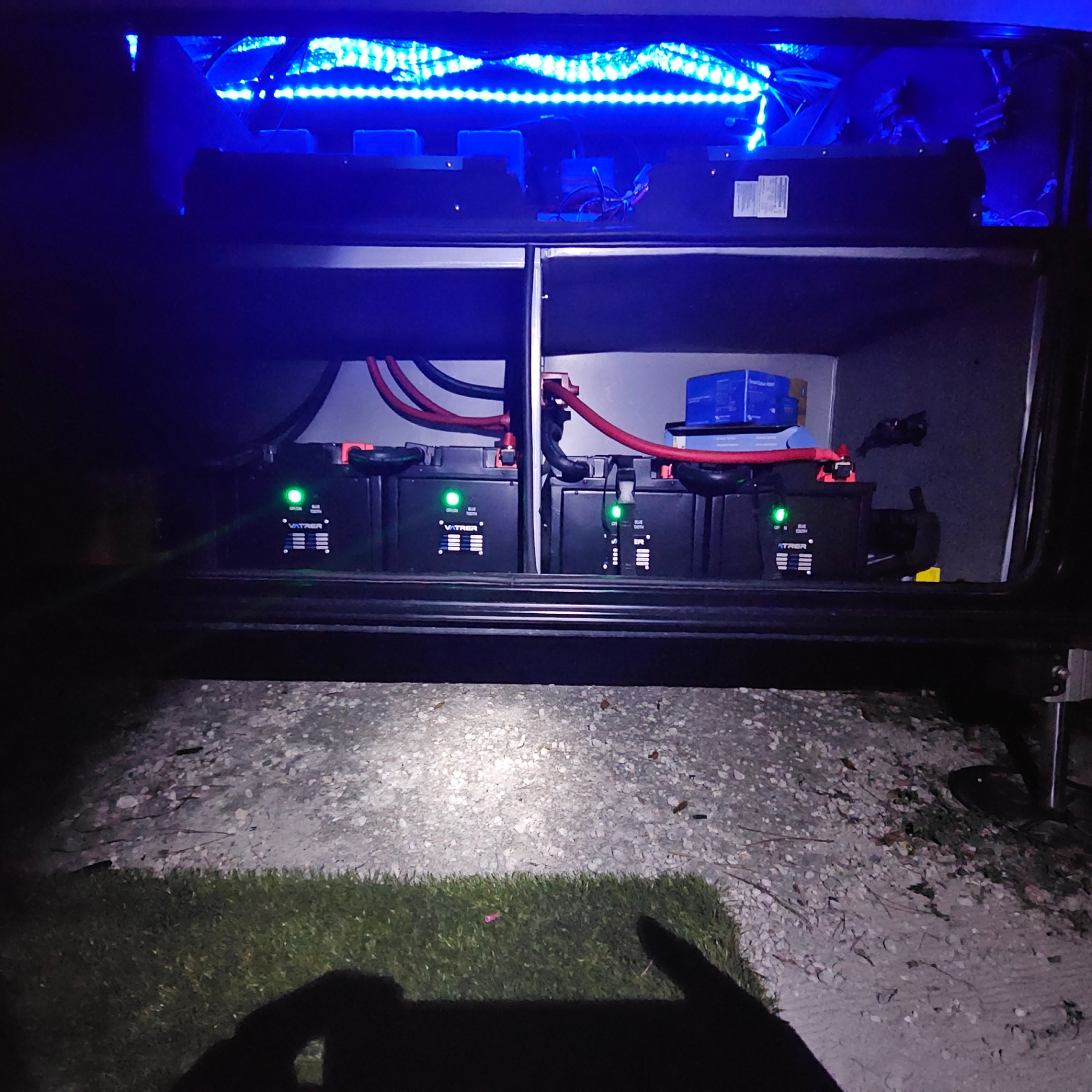 Lithium battery bank at night with service lighting